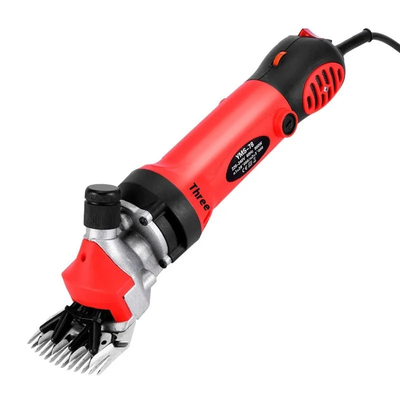 Yellow electric wool shearing tool with 110V plug and multiple knife sets in a plastic storage case.