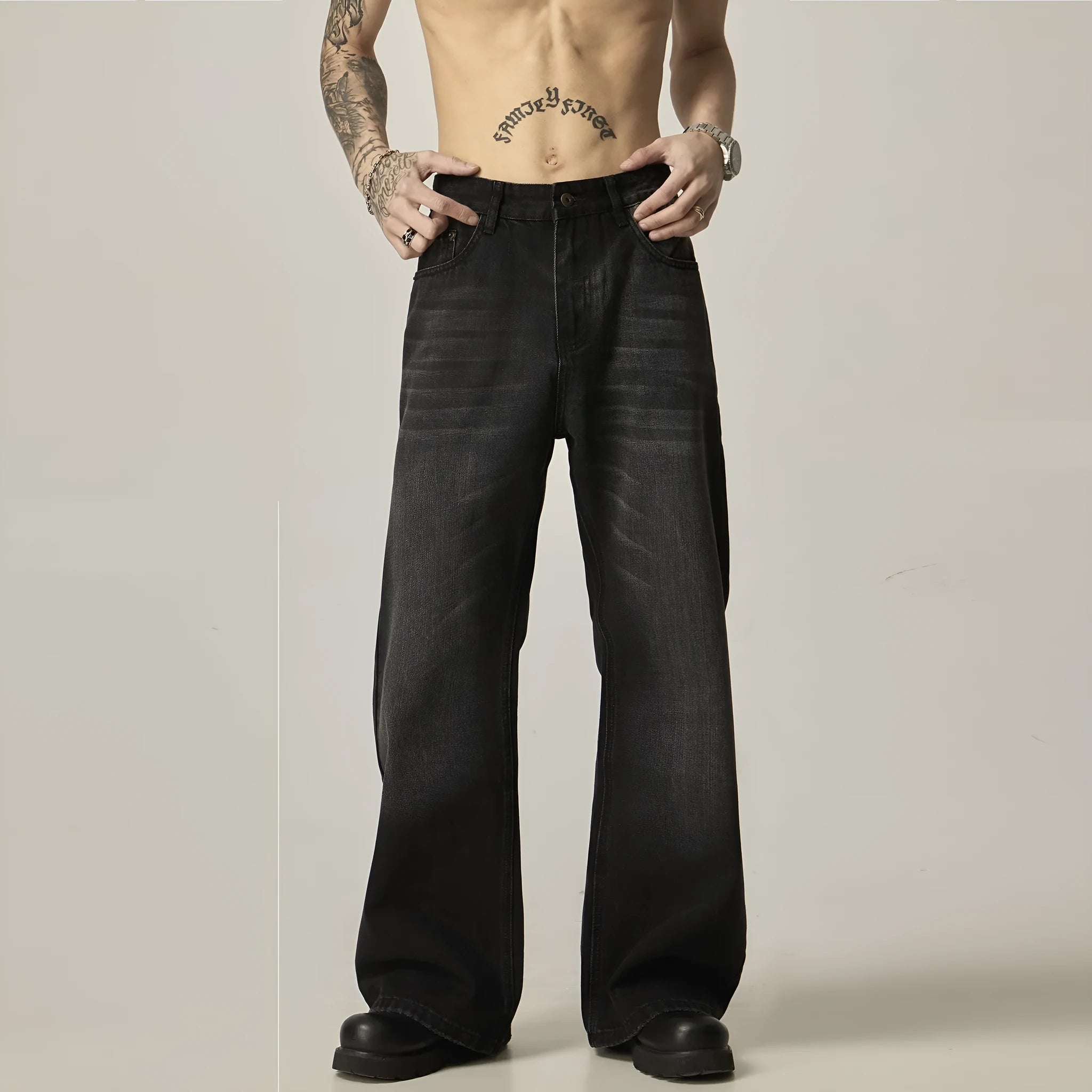 Black loose straight-leg jeans with retro styling and zipper fly