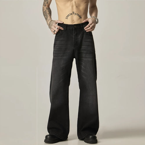 Black loose straight-leg jeans with retro styling and zipper fly