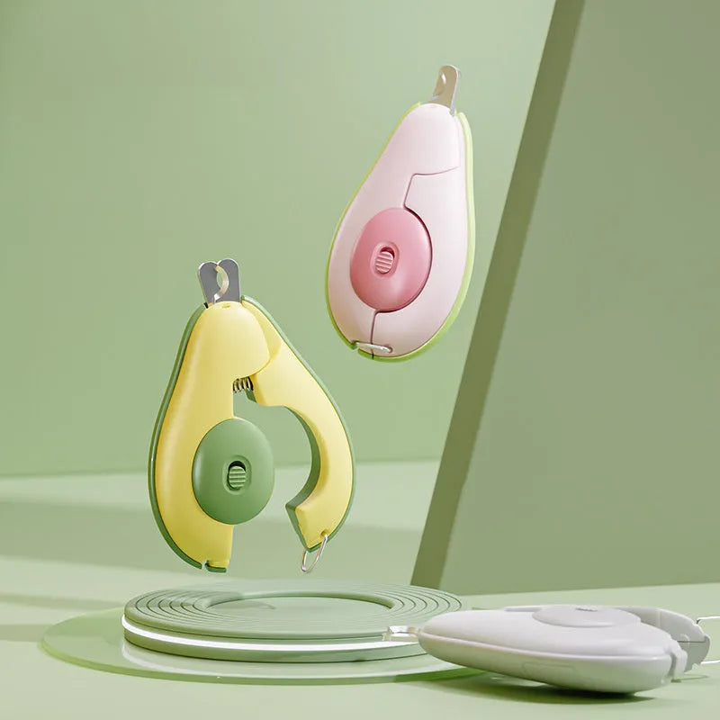 Professional pet nail clipper with LED safety light for trimming small dog and cat claws, shown in green colour.