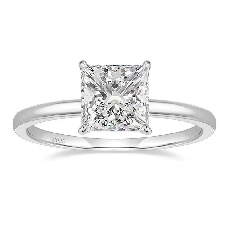 A geometric 925 silver women's ring with a round zirconium stone, shown in gold, rose gold, and silver finishes.