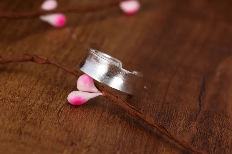 Geometric adjustable open ring with frosted silver electroplated finish