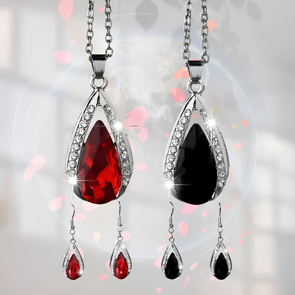 Teardrop pendant necklace and earrings suite with water droplet design in alloy