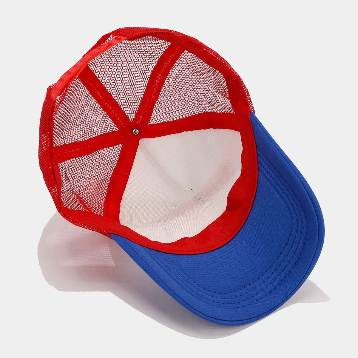 Red and blue contrast mesh baseball cap with adjustable back closure