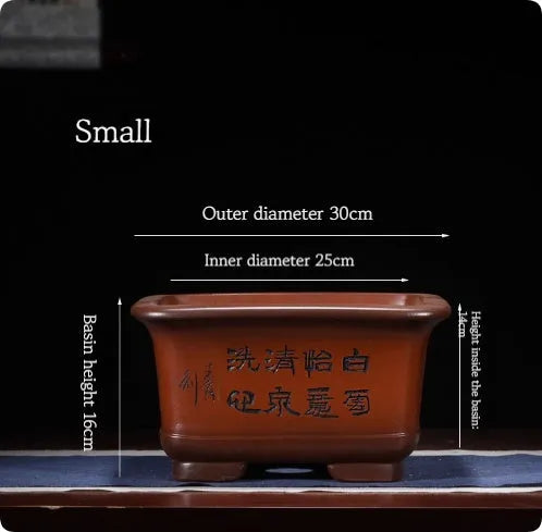 Large purple clay Chinese style flower pot for indoor bonsai or plants.