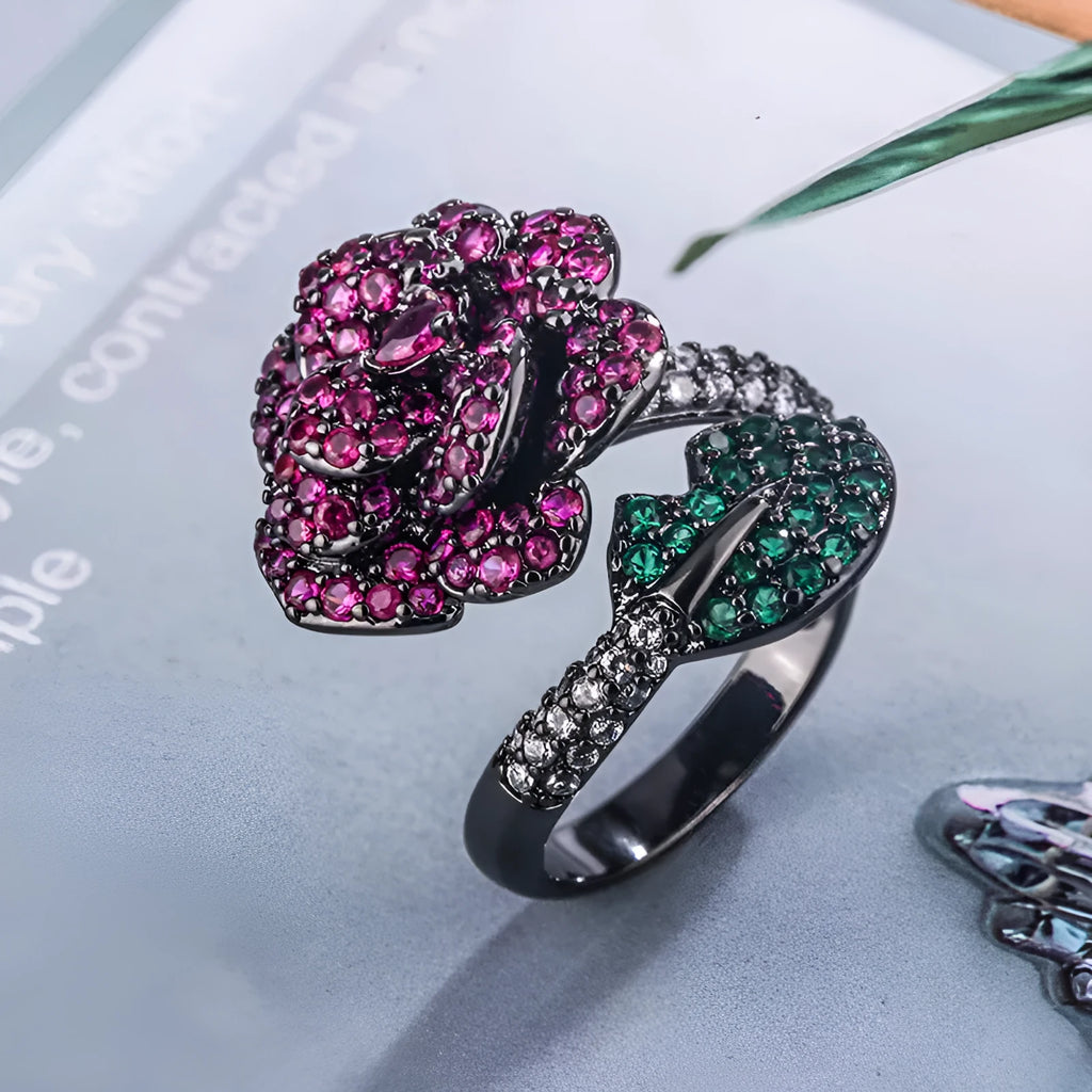 Women's black gold geometric ring with gold-plated red corundum flower detail