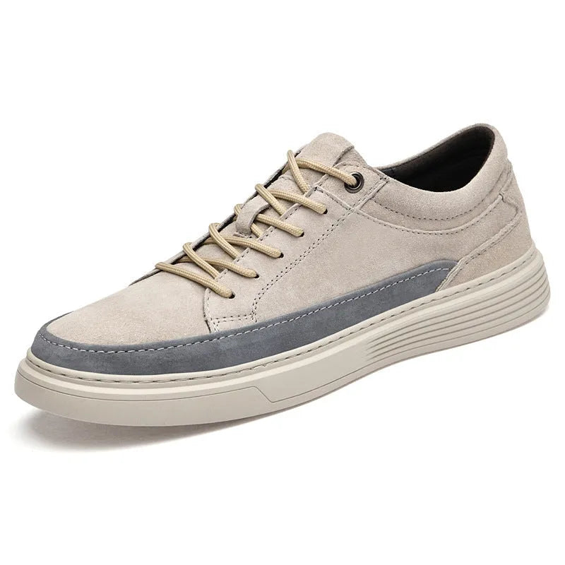 Men's grey casual leather skate shoes with round toe and lace-up front.