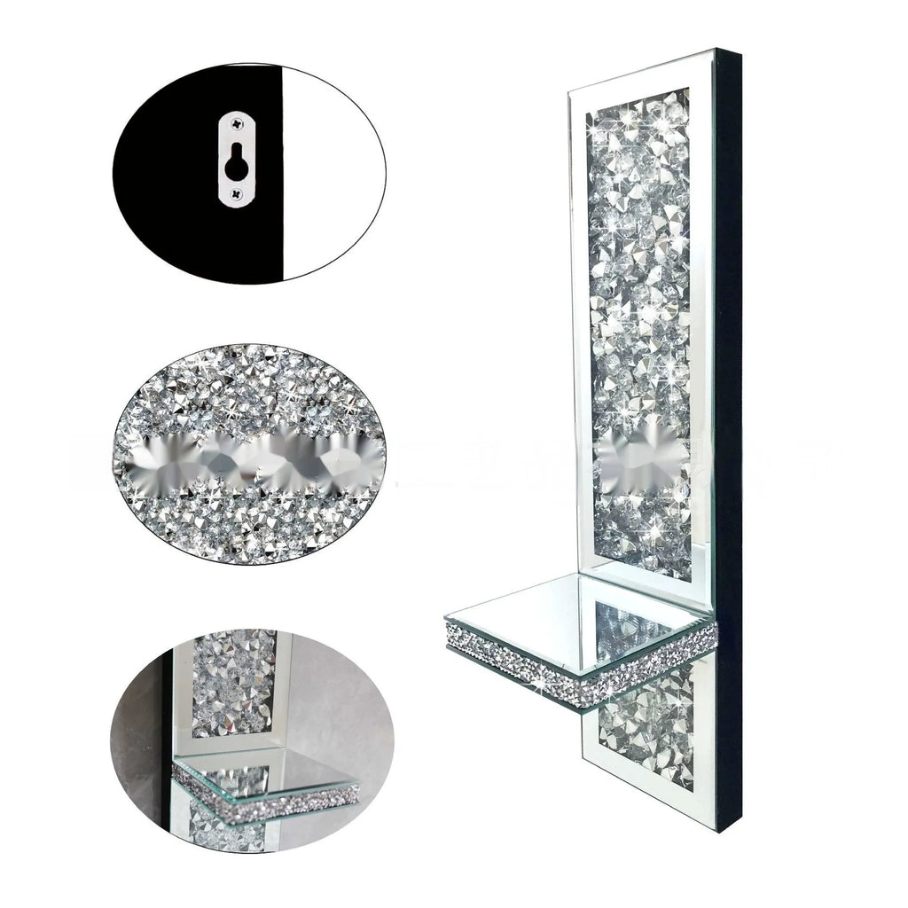 A pair of tall silver mirror glass candle holders designed for wall mounting