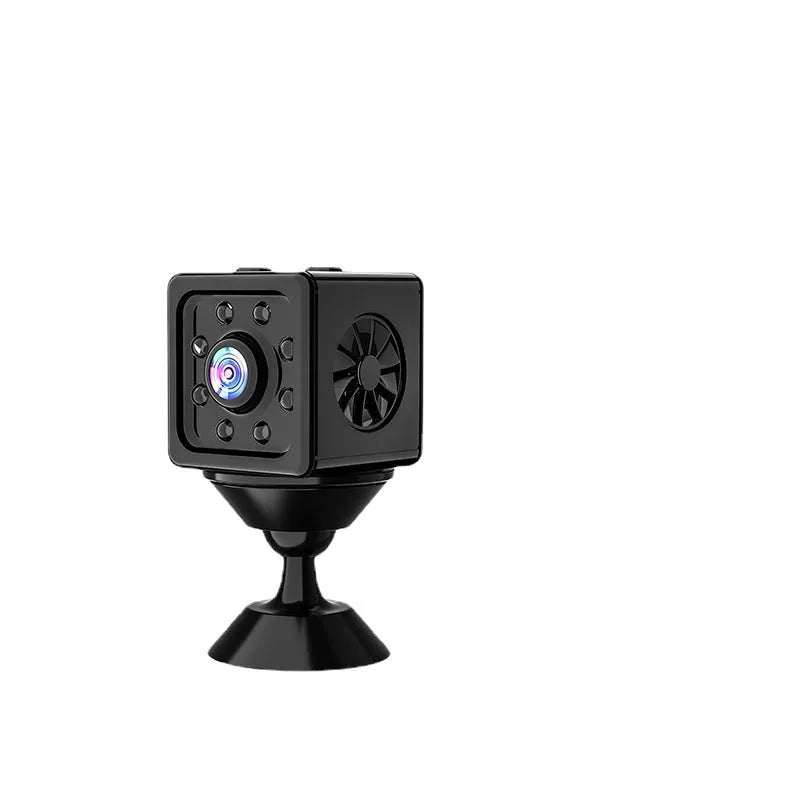 Black cubic sports camera with mounting bracket on white background