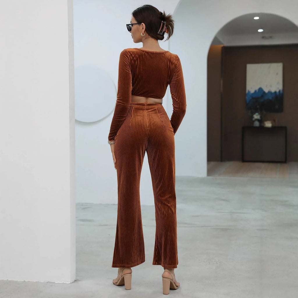 Caramel coloured long sleeve sweater set with matching trousers on hanger