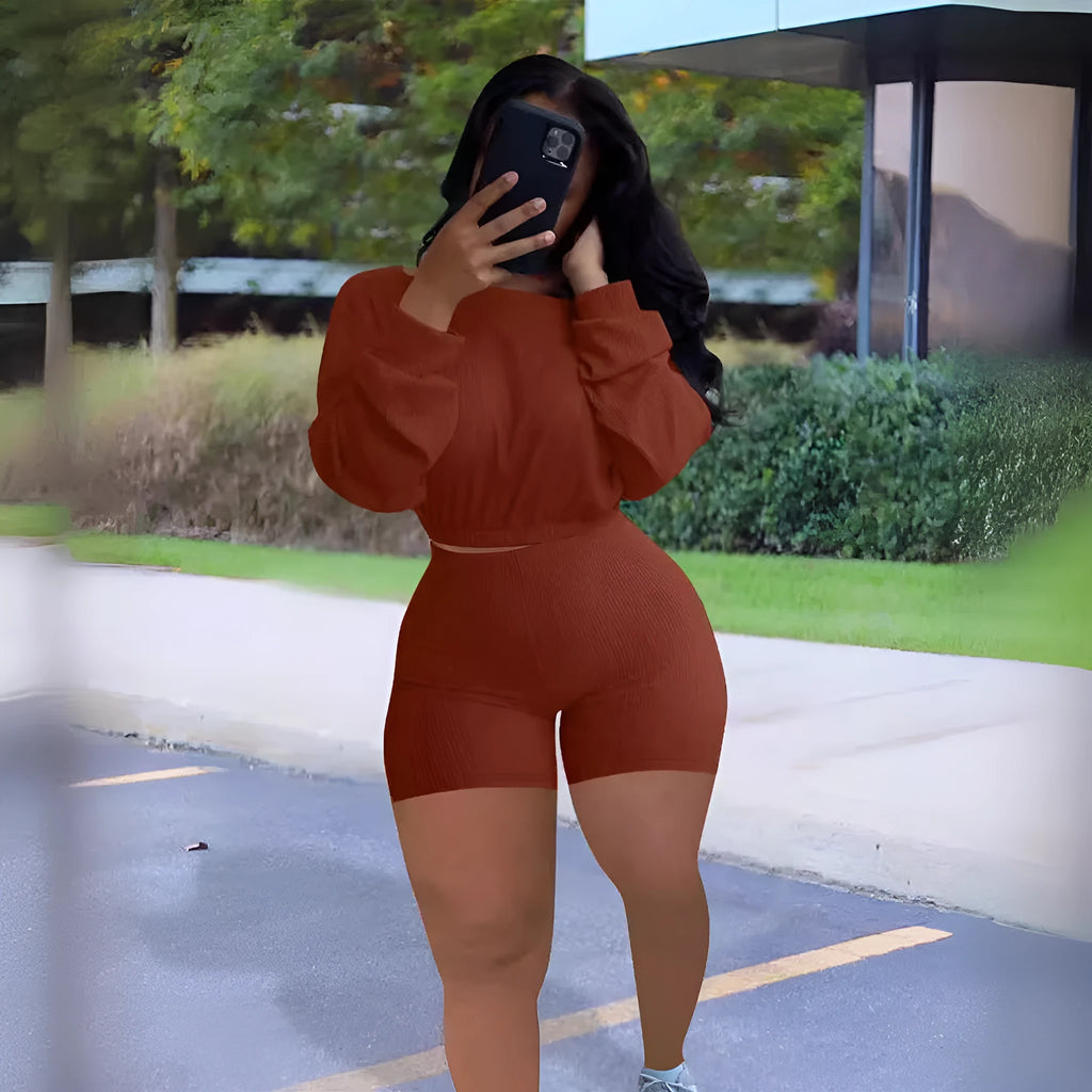 Women's sunken stripe off-the-shoulder long sleeve top and shorts two-piece set in a solid colour.