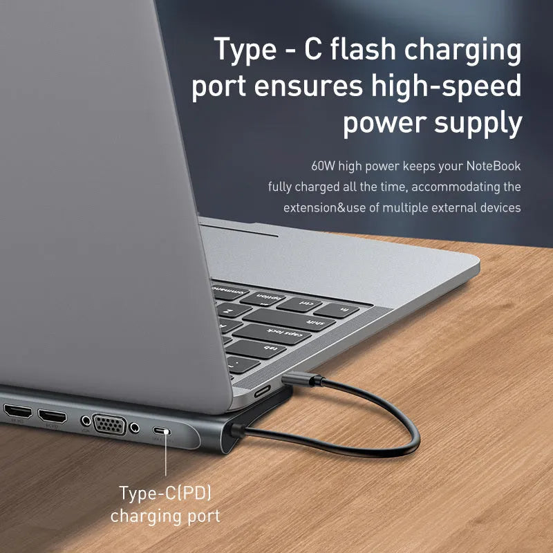 Gray aluminium USB C hub docking station with cooling bracket showing 10 ports including HDMI and Ethernet