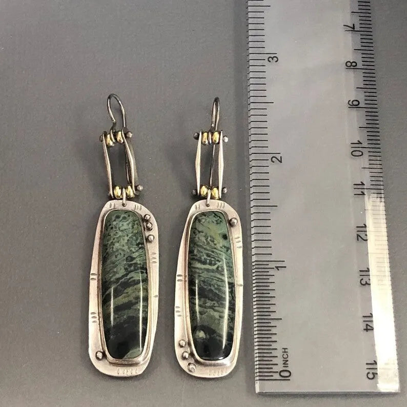 Geometric two-tone marble pattern alloy earrings showing angular shape with marbled colour detailing