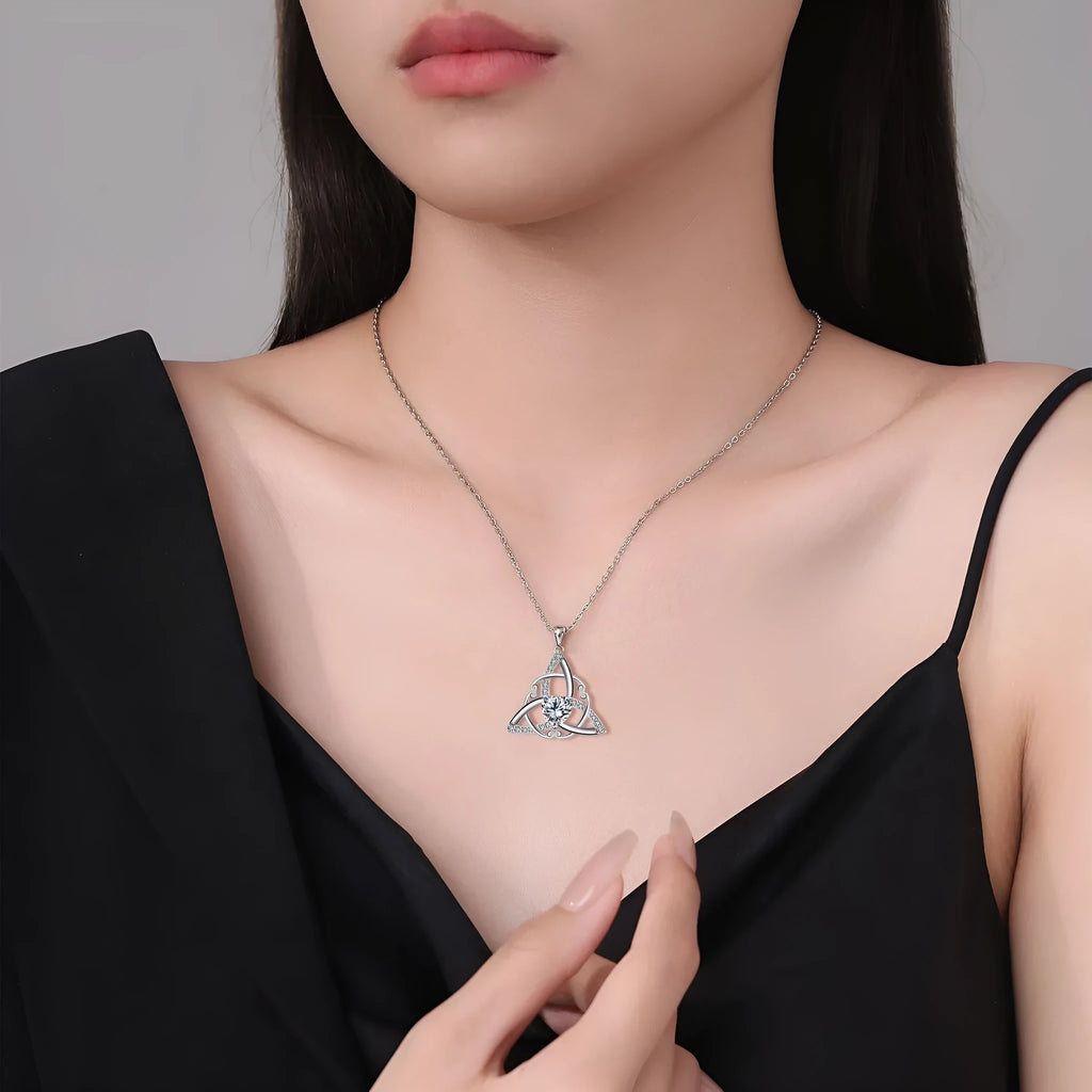Women's geometric Celtic knot pendant necklace in copper with electroplated blue finish