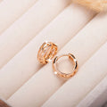 Copper heart and leaf shaped hollow earrings with rose gold finish