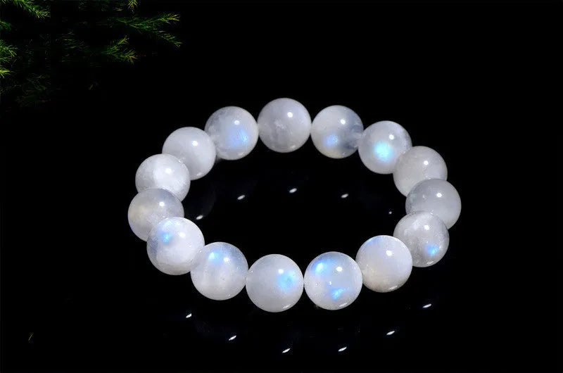 Natural blue moonlight stone round bead bracelet with geometric shapes and polished finish