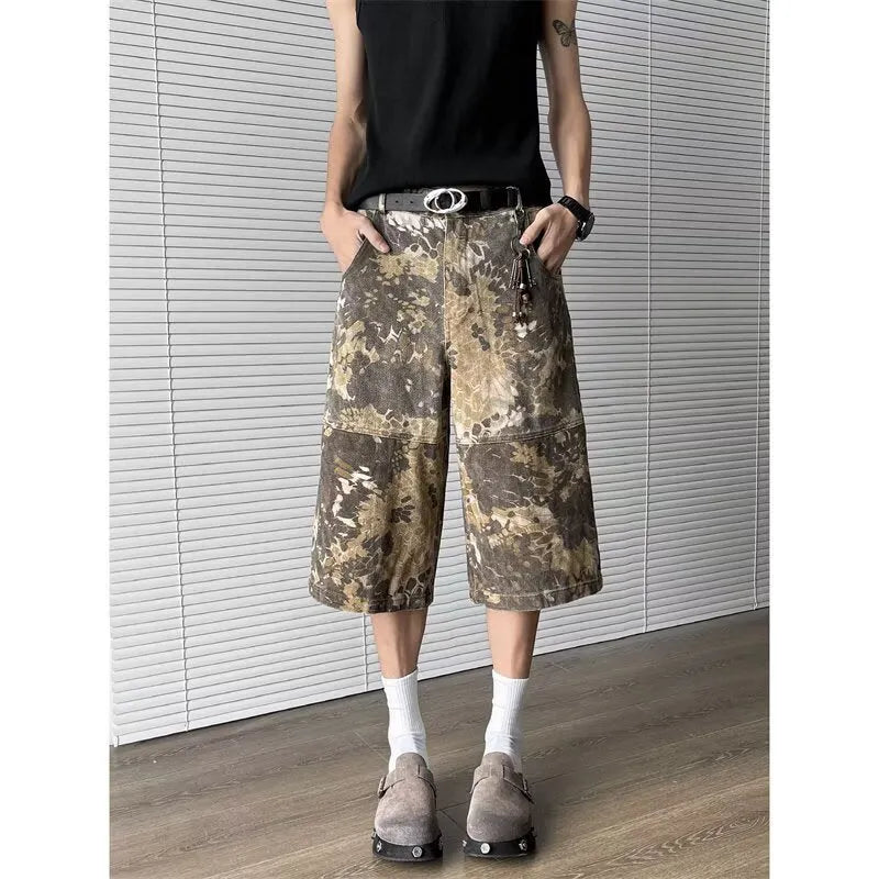 Yellow denim jeans with snake camouflage pattern, cropped length design