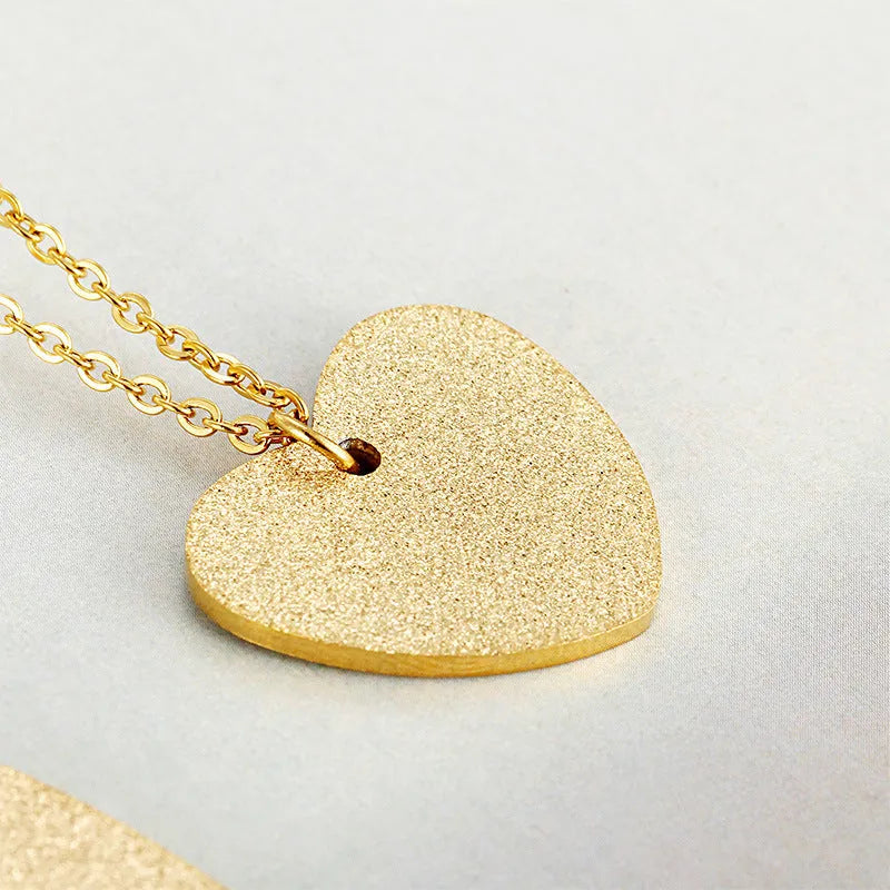 Geometric heart-shaped titanium steel pendant necklace on a chain, silver tone KN25736-Z.