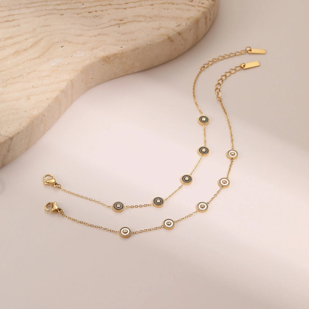 Women's geometric stainless steel bracelet and necklace set with 18K gold plating and fritillary design