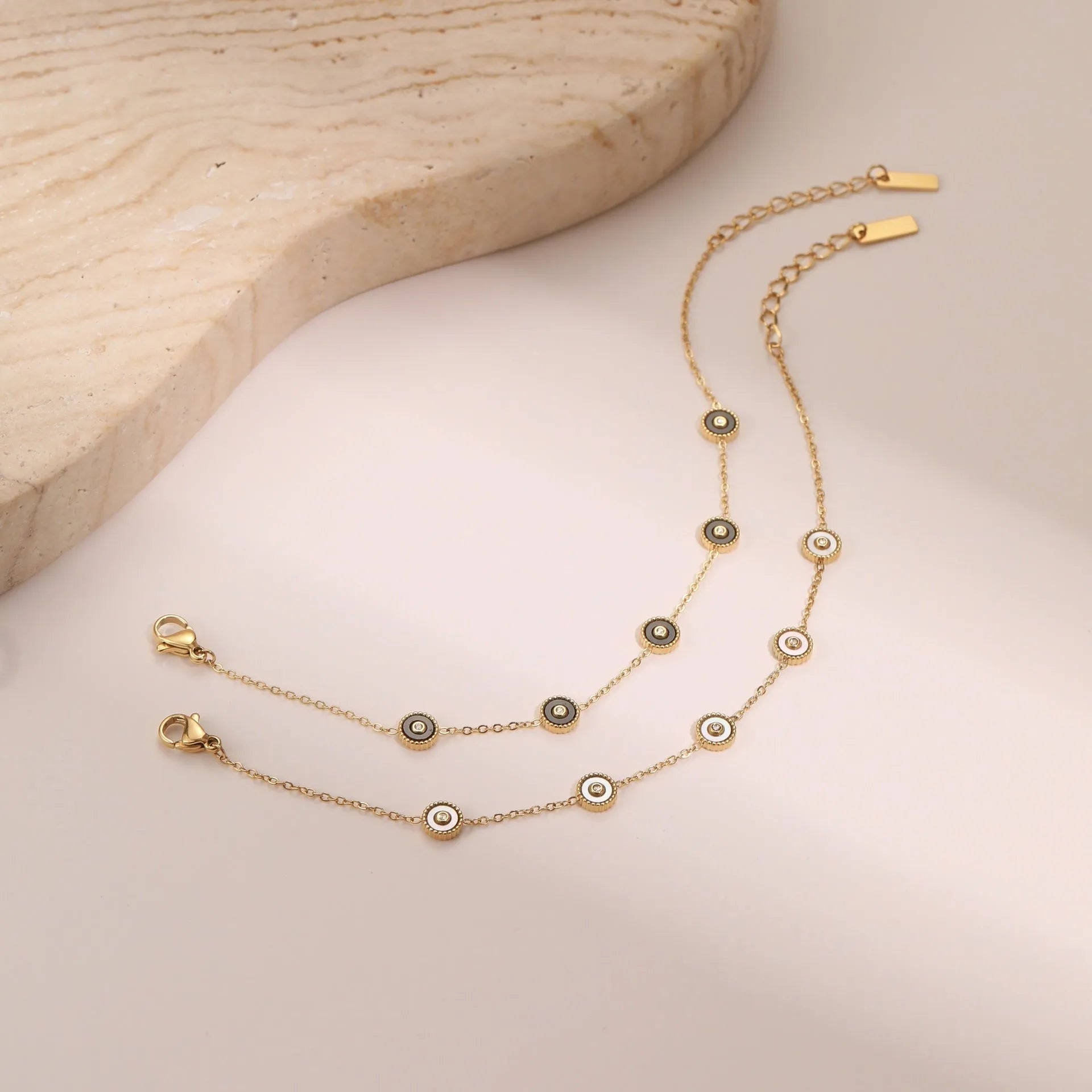 Women's geometric stainless steel bracelet and necklace set with 18K gold plating and fritillary design