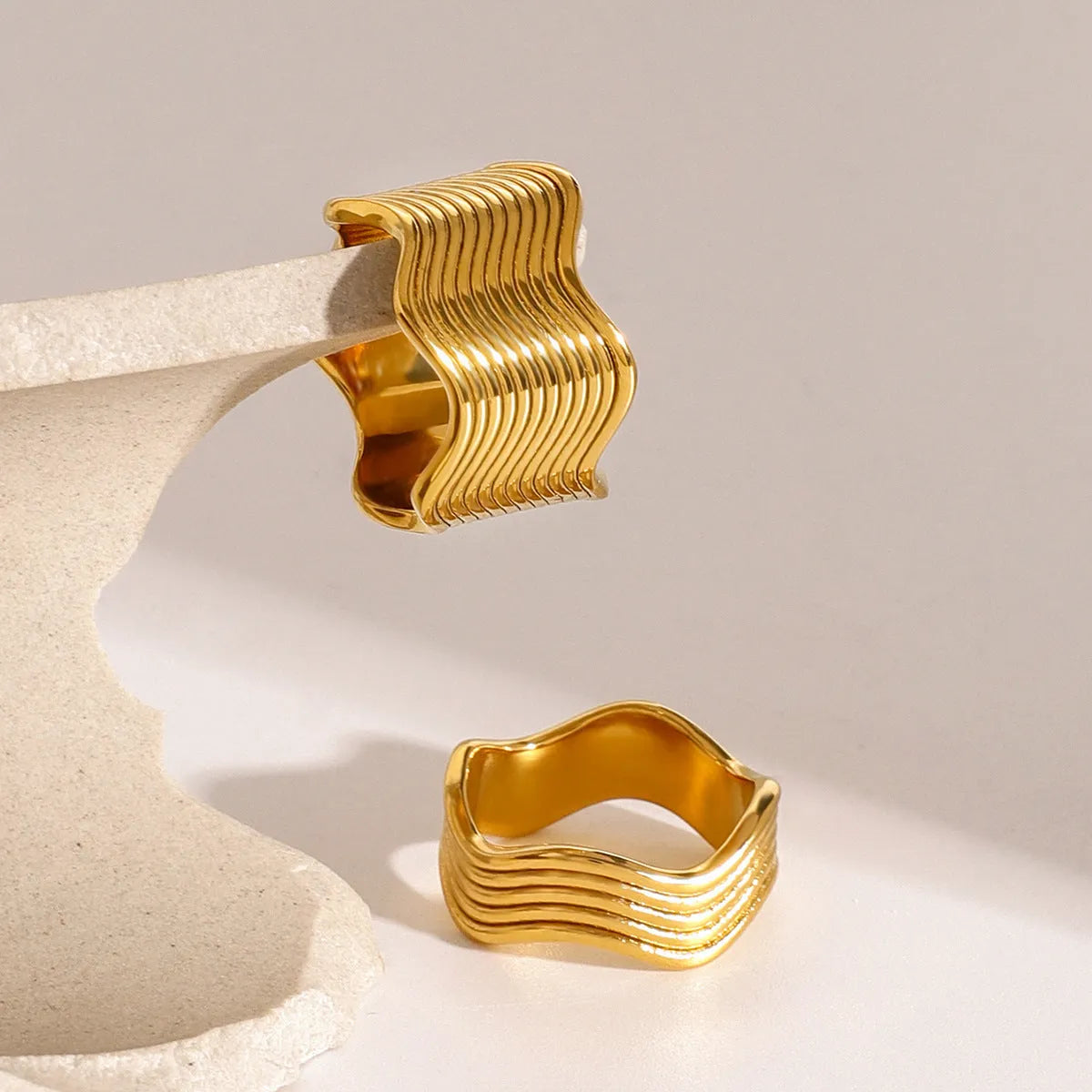 Geometric wave pattern stainless steel ring for women with wide surface design