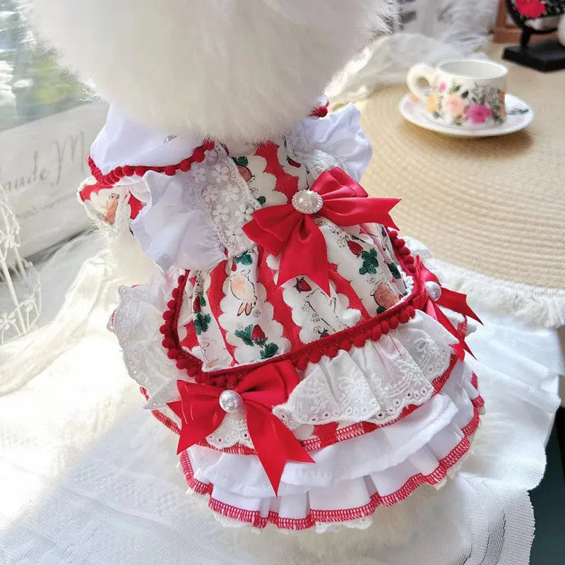 A small dog wearing a white polyester skirt with a rabbit motif, princess style.