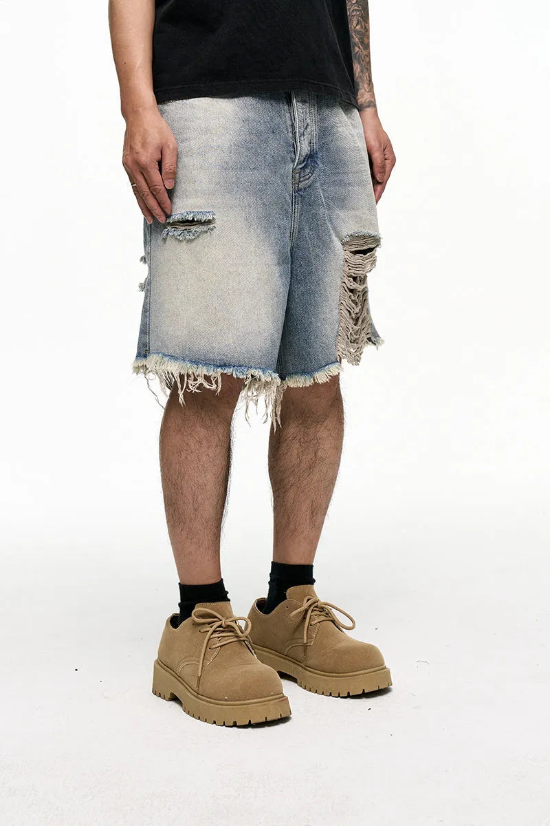 Men's light blue denim shorts with baggy wide leg cut and retro washed finish