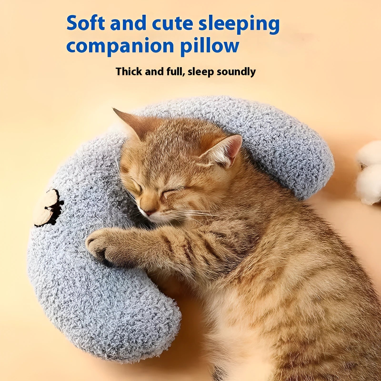 Blue U-shaped cat neck pillow in moon style next to a yellow question mark shaped pet bed.