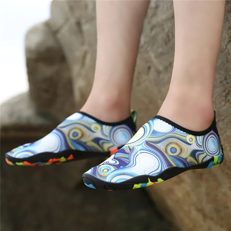 Beach wading shoes in multiple colours with Lycra upper and EVA foam sole.