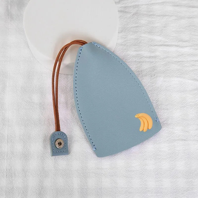 Cartoon-themed PU leather car key case with pull-out mechanism measuring 14x7.5 cm
