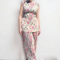 Long sleeve floral print chiffon top and high-waist skirt two-piece dress set on a hanger
