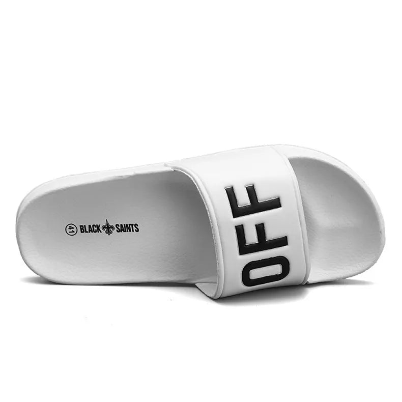 Large men's open toe slippers with a black viscose upper and rubber sole, shown on a size 46 label.