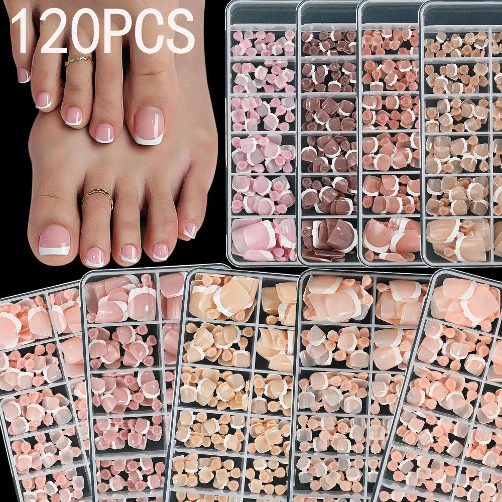 Open box showing 120 French style toe nail pieces with white tips in various nude colours.