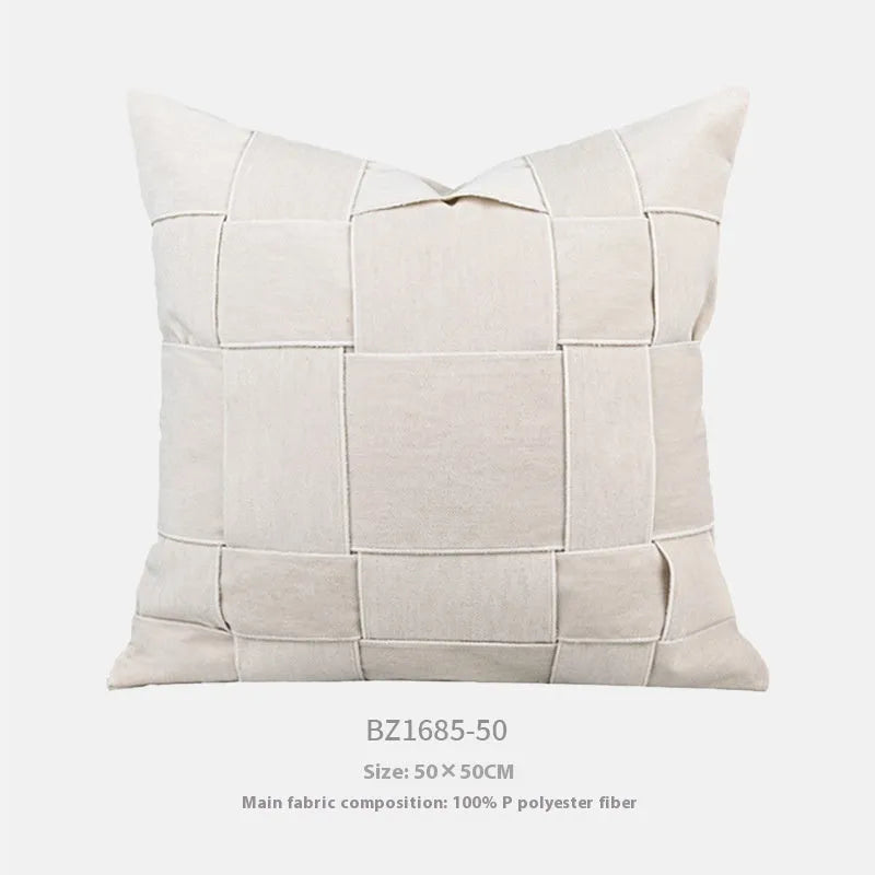 Square chenille woven cushion in beige colour showing textured surface