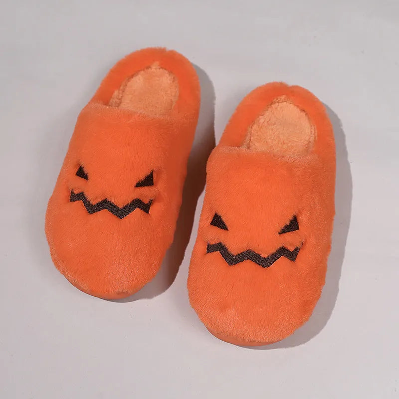 Orange Halloween pumpkin slippers with plush lining and non-slip PVC soles