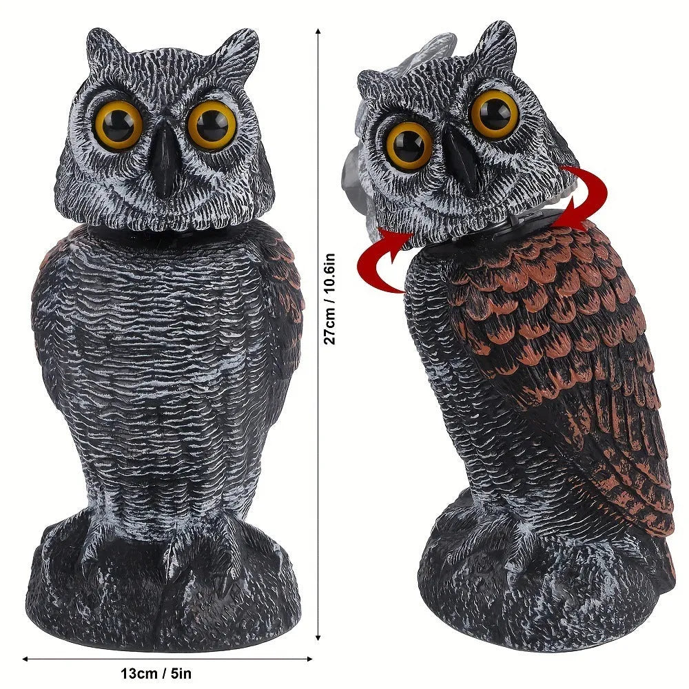 Artificial owl bird deterrent ornament with moving head in outdoor setting