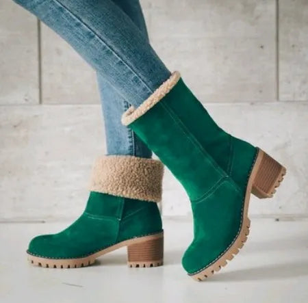 Women's mid-tube suede snow boots in black with a thick heel and waterproof platform.