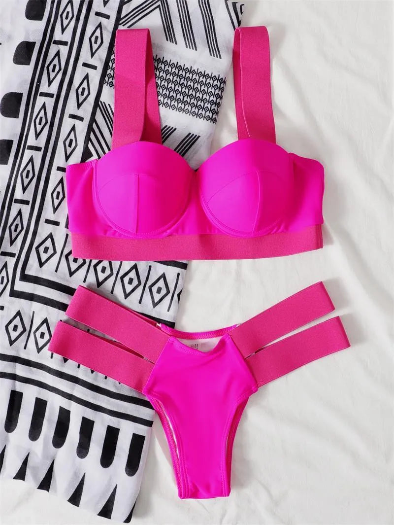 Women's contrast colour bikini swimsuit with steel bracket push-up, shown in rose red.