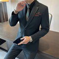 Men's slim fit business blazer in a dark green viscose blend fabric, shown on a model.