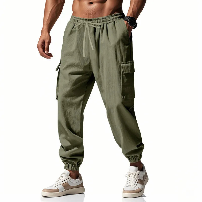 Men's casual linen trousers with ankle-tied cuffs and multi-pocket design in solid colour