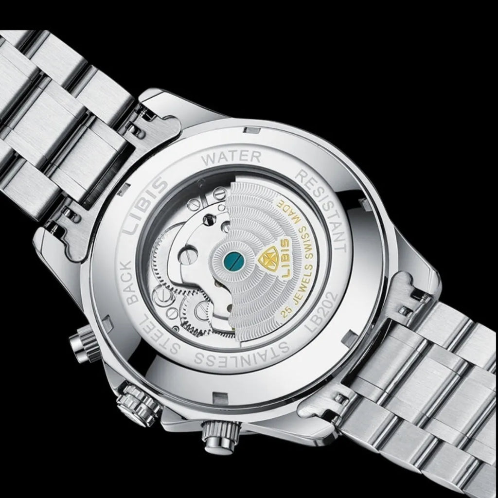 Men's silver stainless steel automatic perpetual calendar mechanical watch on wrist.