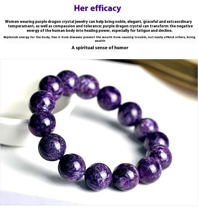 Natural transparent charoite crystal bracelet with platinum elements on a wrist.