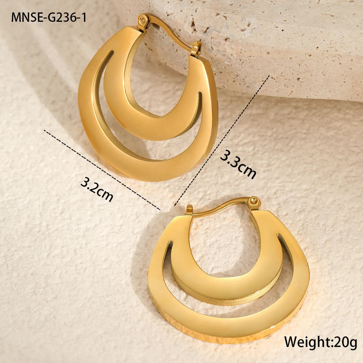 Geometric French earrings with circular ring design in gold and steel metallic finishes
