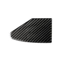 Carbon fibre textured sticker for covering a device charging port panel, showing the 3M adhesive backing.