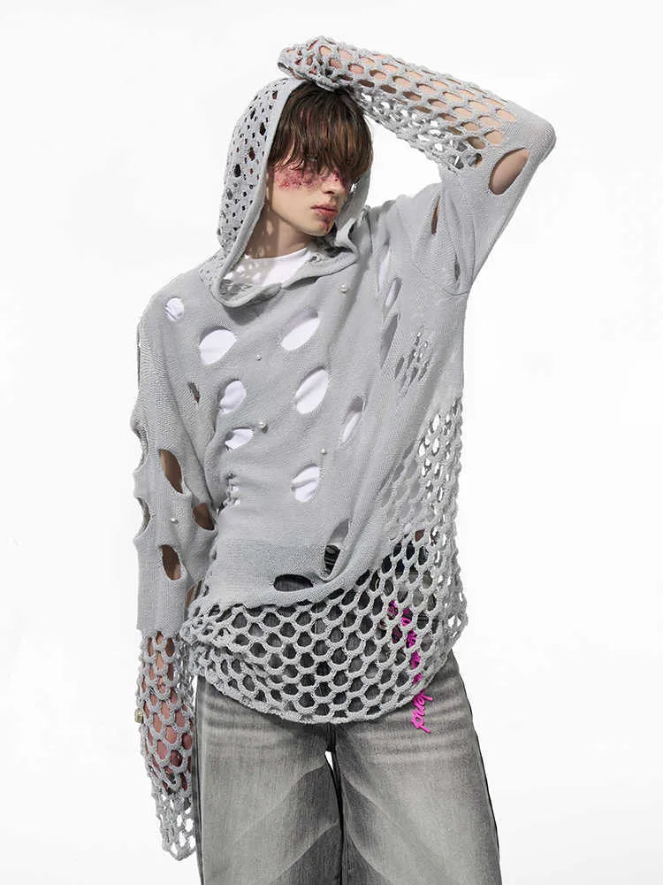 Men's black loose-fit hooded sweater with pearl decoration showing pullover design and regular sleeves