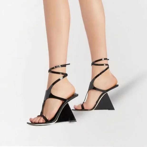 Women's black high heel sandals with a square toe and a 9.5cm rubber heel on a white background.