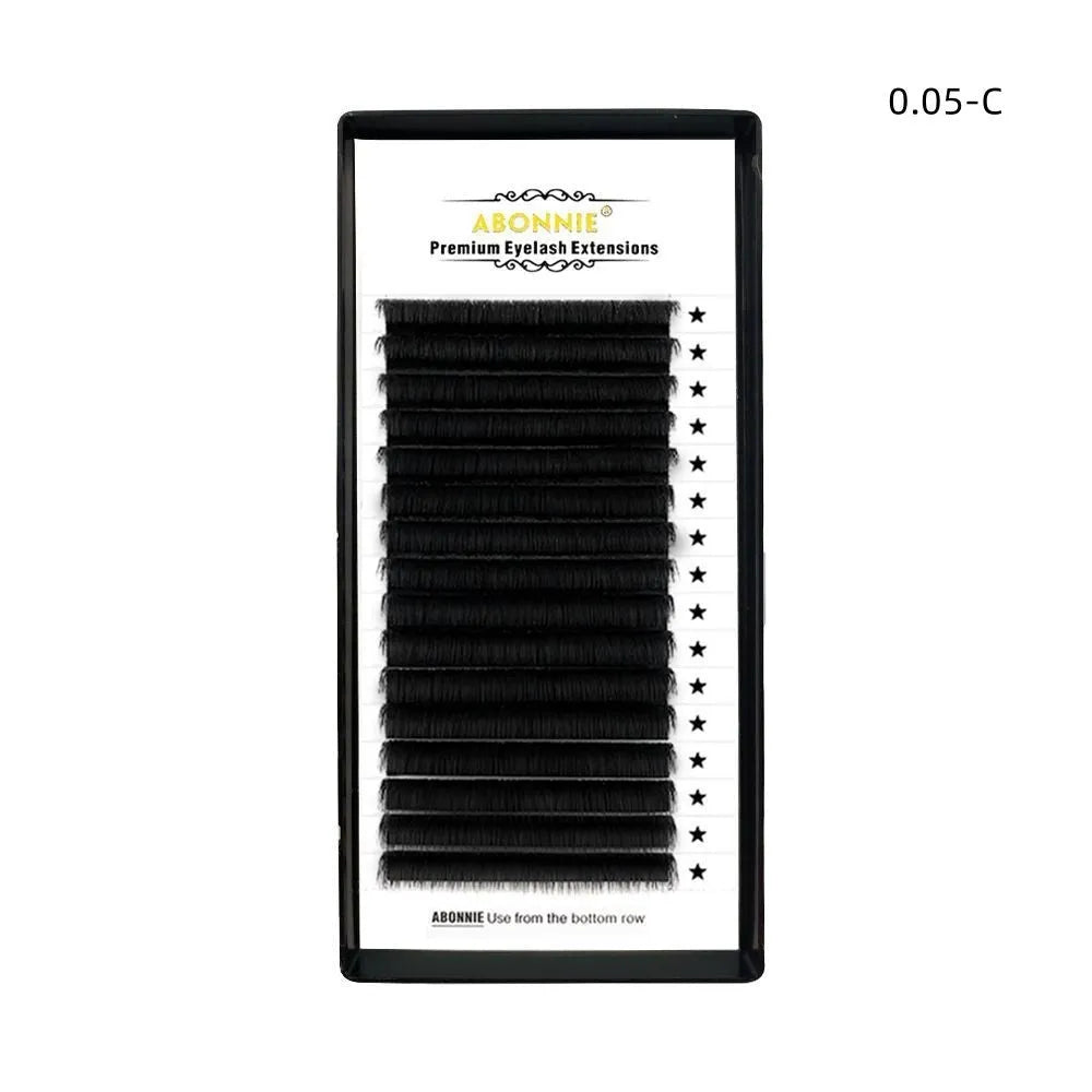 Pair of dense 16-row false eyelashes made from mink hair, showing a matte finish.