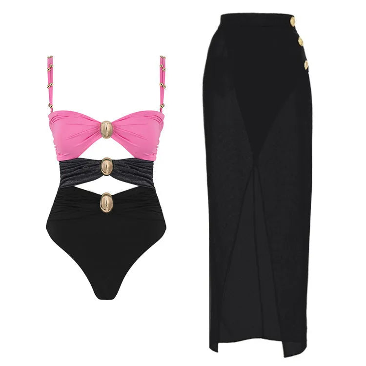 Women's solid colour one-piece swimsuit with detachable skirt and gold button detail