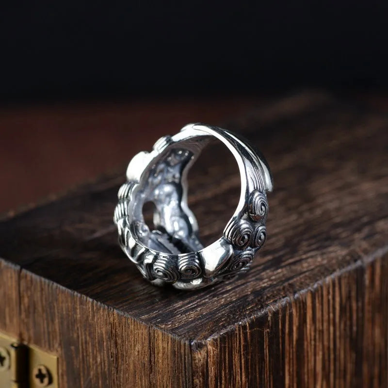 Personalised silver open ring with a diamond-patterned jibeast or animal zodiac design.