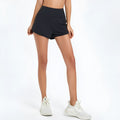 Women's nylon fitness shorts in high-waist design, quick-dry fabric, black/water blue/white colours
